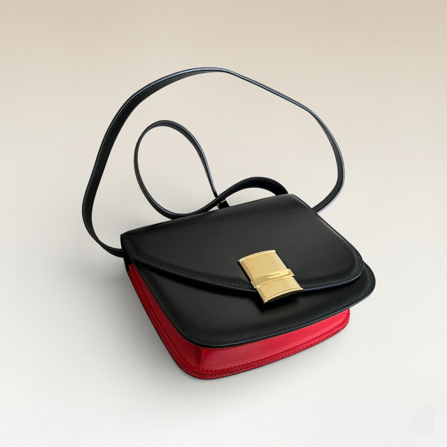 Salvatore Ferragamo Fiamma S Assymetric Leather Bag Black And Red