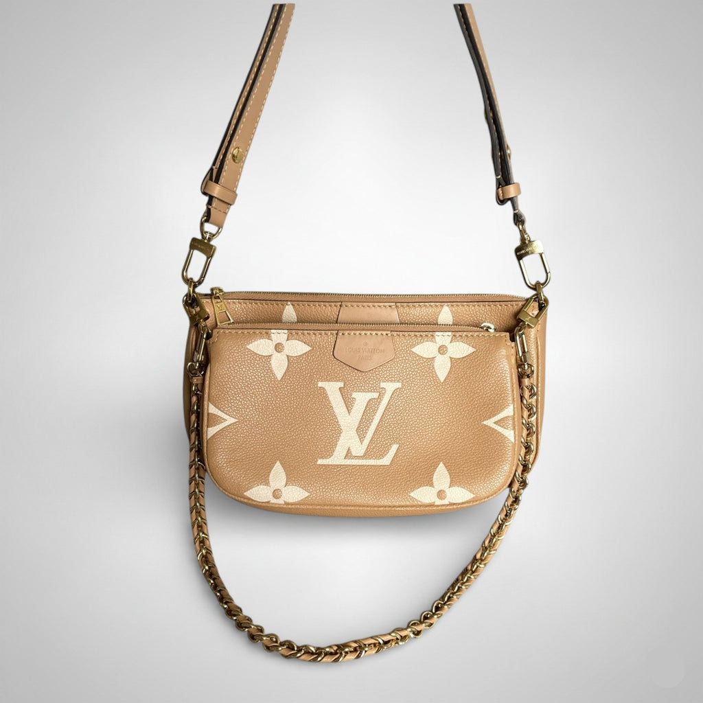 Louis Vuitton Multi Pochette Accessoires In Empreinte Leather With Large LV Monogram Print Caramel Colour