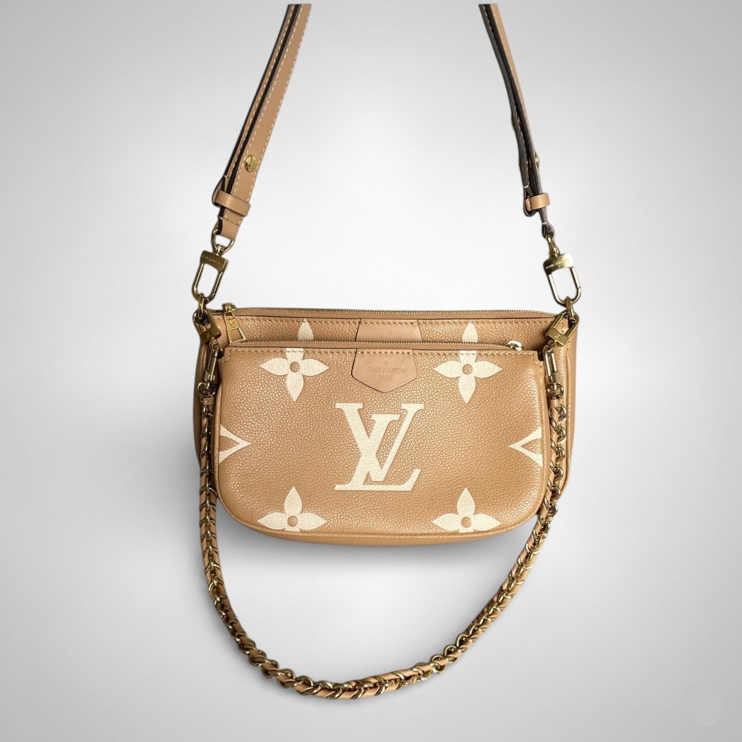 Louis Vuitton Multi Pochette Accessoires In Empreinte Leather With Large LV Monogram Print Caramel Colour