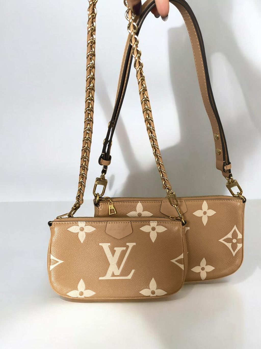 Louis Vuitton Multi Pochette Accessoires In Empreinte Leather With Large LV Monogram Print Caramel Colour